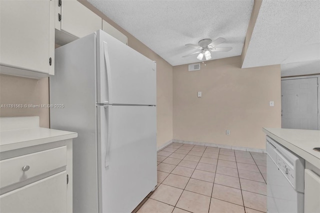 kitchen with white cabinetry, white appliances, light countertops, and ceiling fan