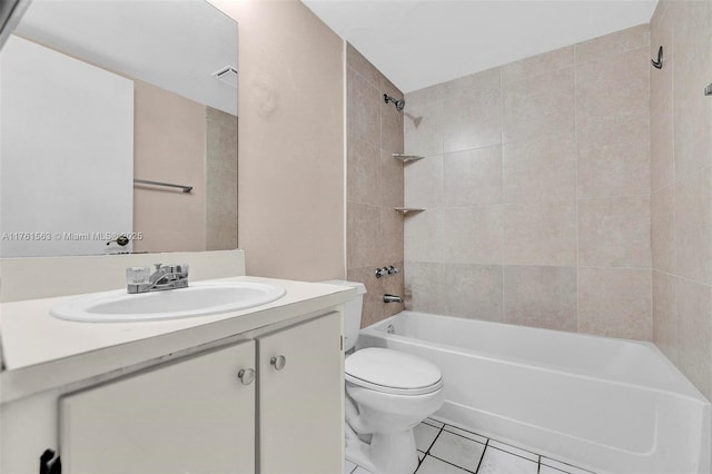 full bath featuring toilet, bathtub / shower combination, vanity, and tile patterned flooring