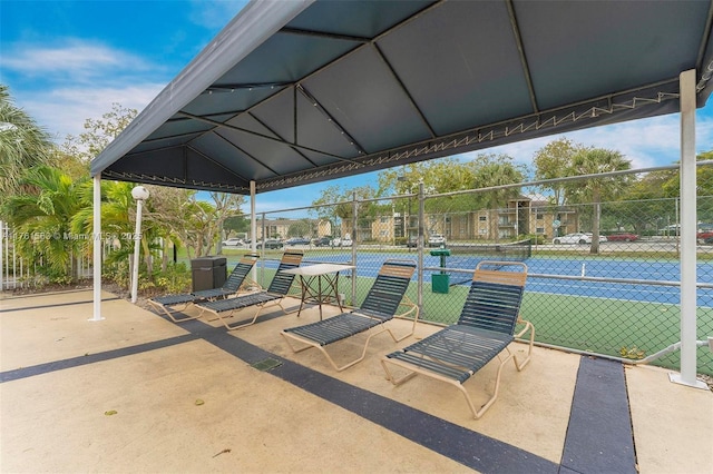 view of patio / terrace featuring fence