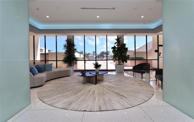 interior space featuring a raised ceiling