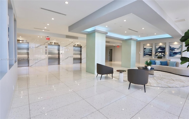 building lobby featuring visible vents
