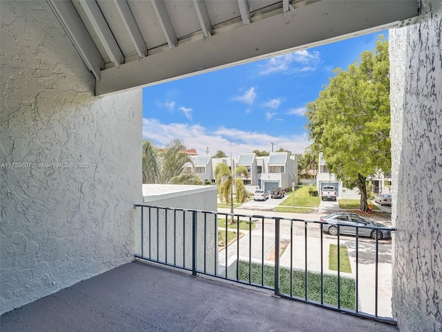 balcony featuring a residential view