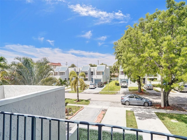 balcony featuring a residential view