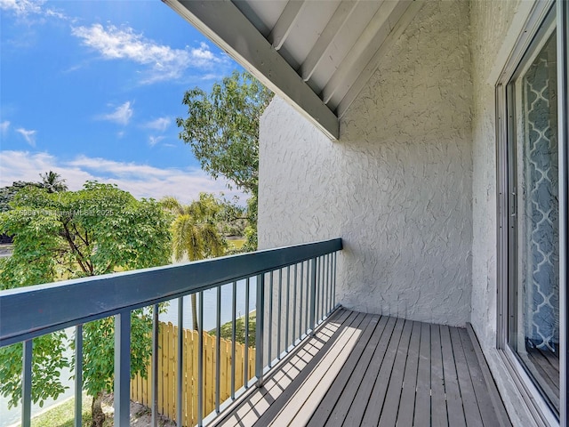 balcony featuring a water view