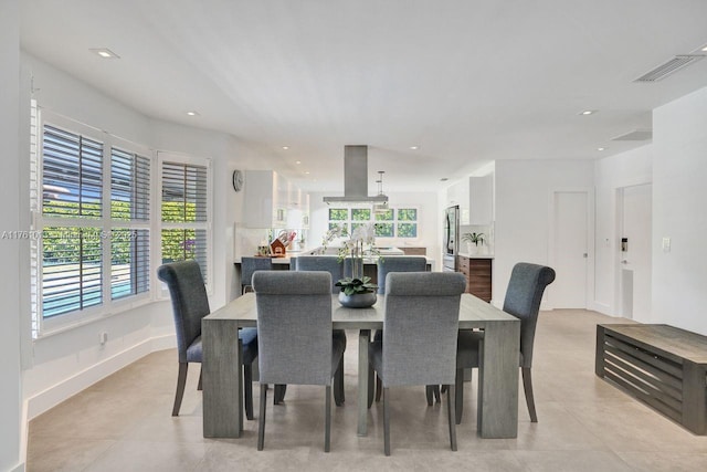 dining area with light tile patterned floors, recessed lighting, and visible vents