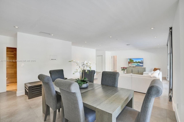 dining space with visible vents and recessed lighting