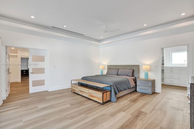 bedroom featuring recessed lighting, baseboards, light wood-style floors, and a ceiling fan