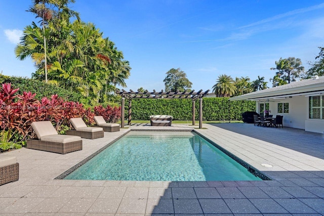 view of swimming pool with a fenced in pool and a pergola