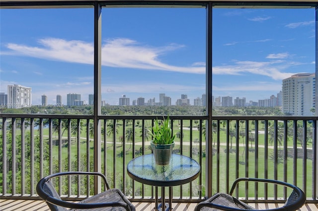 unfurnished sunroom with a view of city