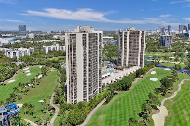 aerial view with a city view and view of golf course