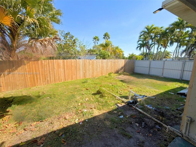 view of yard featuring a fenced backyard