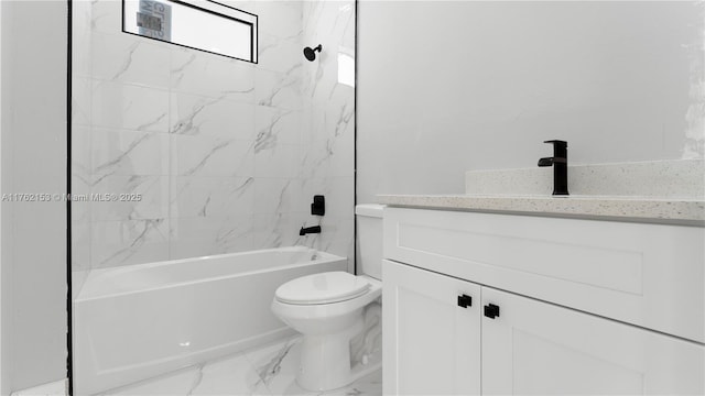 full bath featuring vanity, toilet, marble finish floor, and shower / bathtub combination