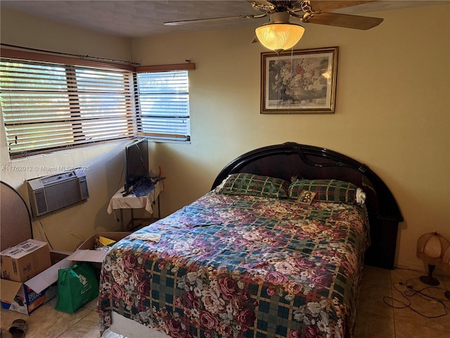 tiled bedroom featuring cooling unit and a ceiling fan