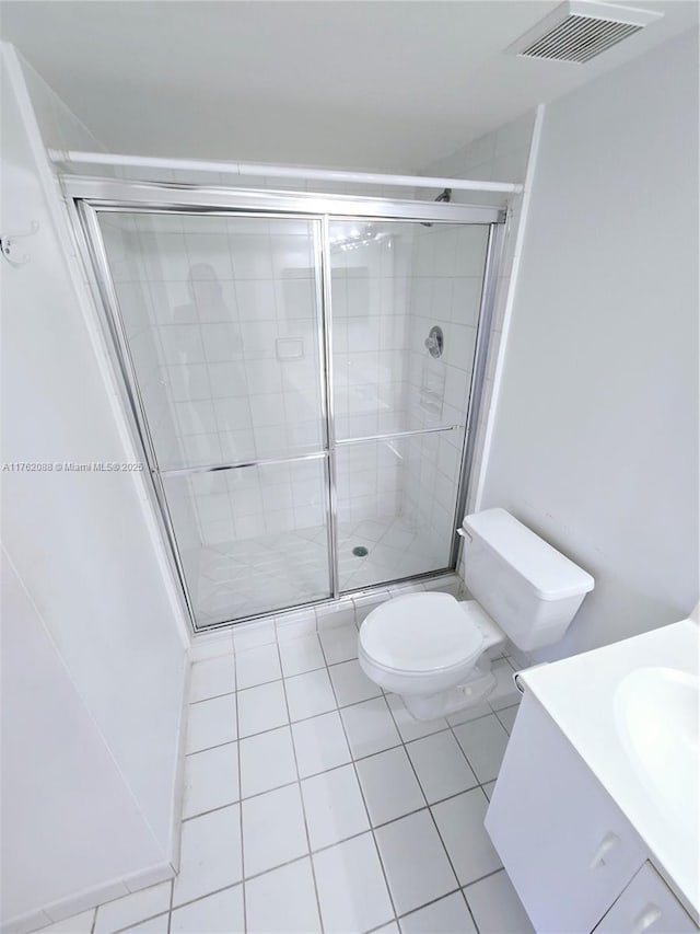 3300 NE 191st St Unit 609, Aventura, FL 33180 - full bath featuring tile patterned floors, visible vents, a stall shower, and toilet