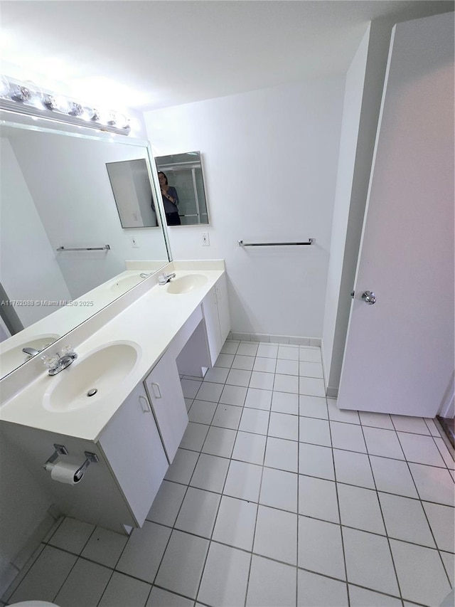 3300 NE 191st St Unit 609, Aventura, FL 33180 - full bathroom with a sink, double vanity, and tile patterned flooring