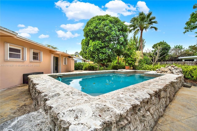 outdoor pool with a patio