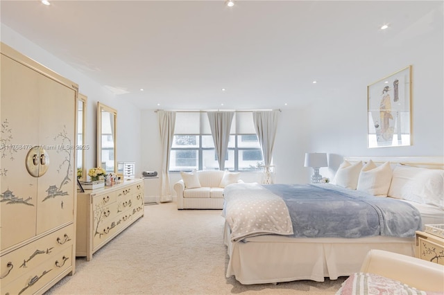 bedroom with recessed lighting and light colored carpet