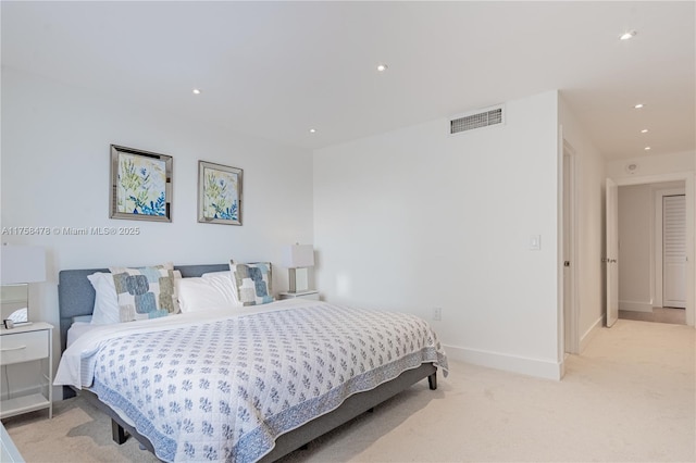 bedroom with recessed lighting, baseboards, visible vents, and light carpet