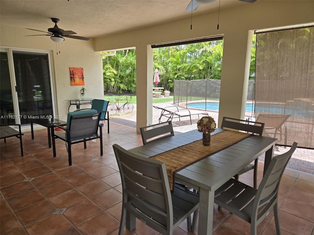 14384 SW 167th Ter, Miami, FL 33177 - view of patio with a ceiling fan and outdoor dining space