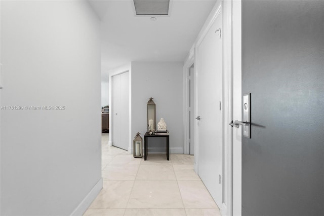 500 Brickell Ave Unit 2510, Miami, FL 33131 - hallway with light tile patterned floors, baseboards, and visible vents