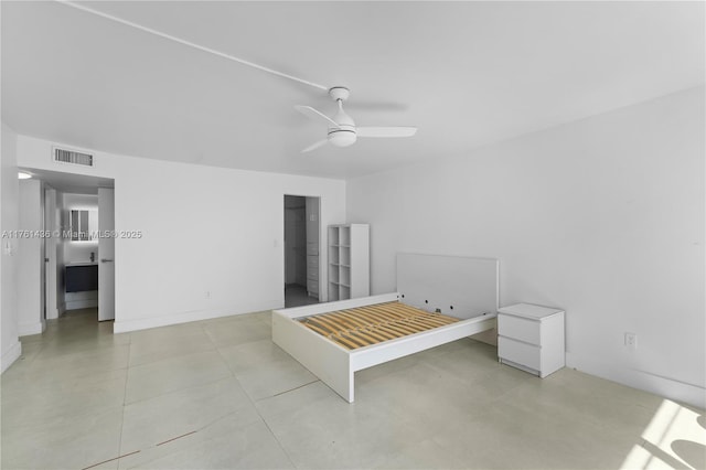 bedroom featuring visible vents, baseboards, and ceiling fan