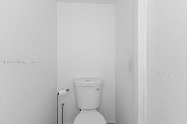 bathroom featuring toilet