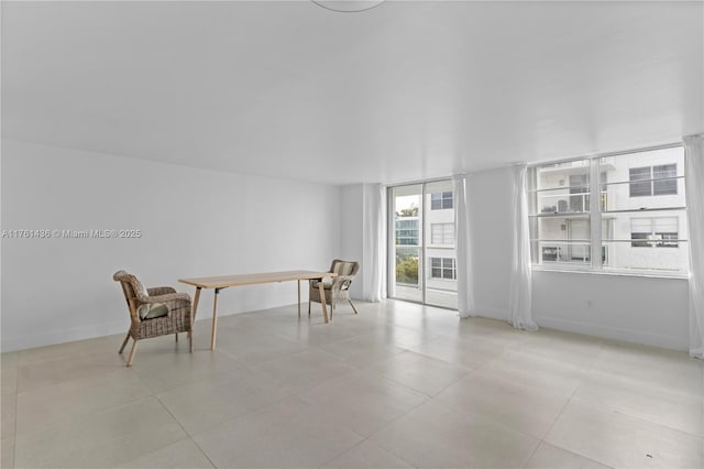 dining area featuring baseboards