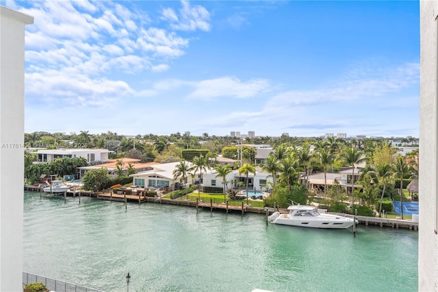 property view of water featuring a residential view and a dock