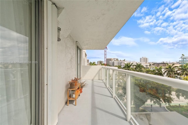 balcony featuring a city view