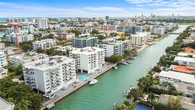 bird's eye view with a water view and a city view