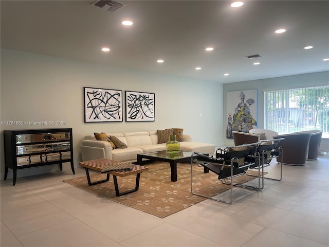 living room with visible vents and recessed lighting