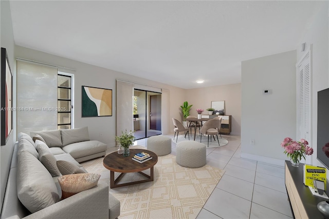 living room with light tile patterned floors