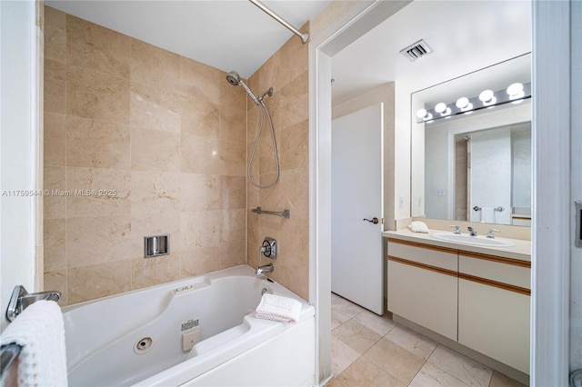 full bathroom featuring vanity, visible vents, and a combined bath / shower with jetted tub