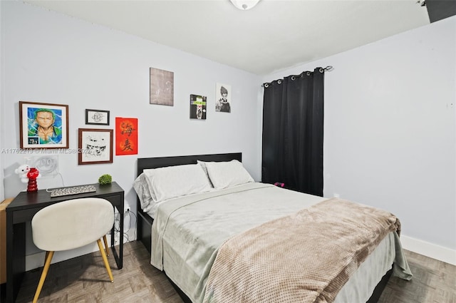 bedroom with baseboards