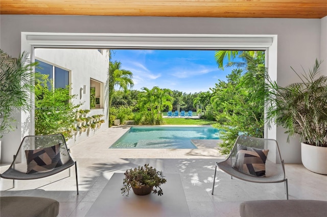 outdoor pool featuring a patio area