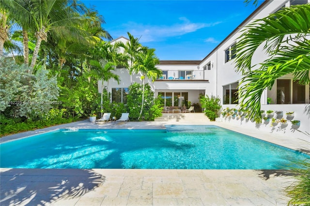 pool with a patio