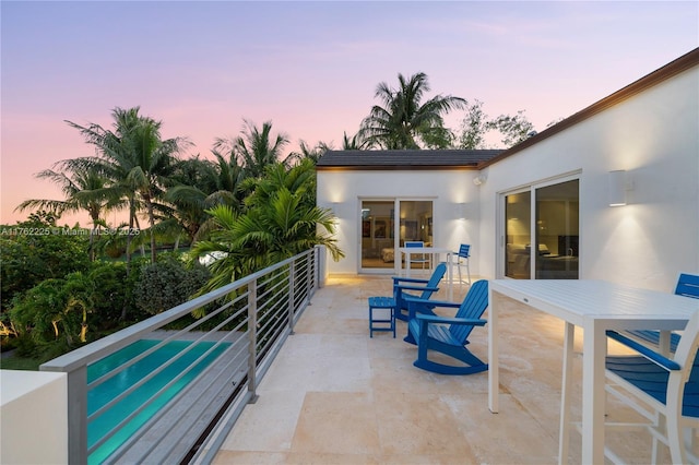 view of patio / terrace with a balcony