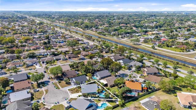 birds eye view of property with a residential view