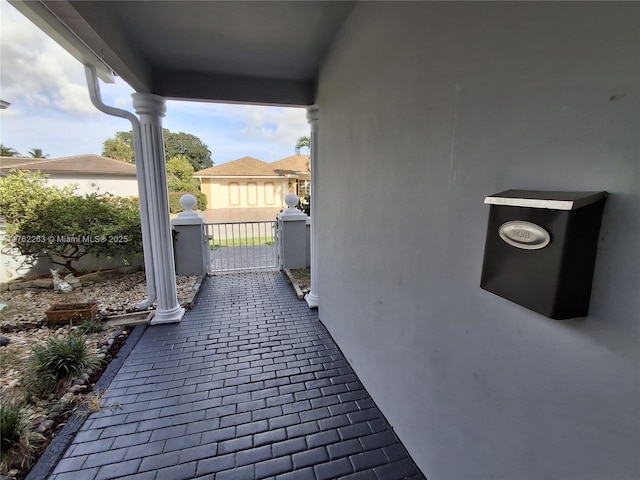 4511 Queen Palm Ln, Tamarac, FL 33319 - view of patio / terrace featuring a gate