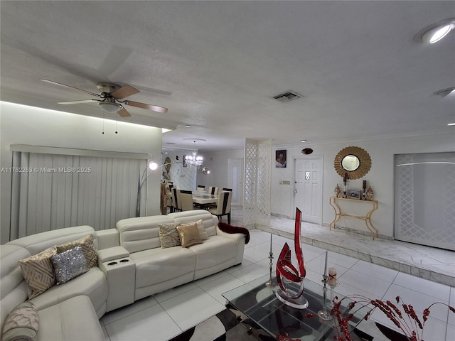 4511 Queen Palm Ln, Tamarac, FL 33319 - living room with tile patterned floors, a chandelier, and ceiling fan