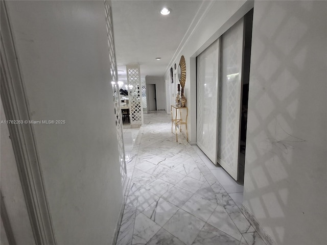 4511 Queen Palm Ln, Tamarac, FL 33319 - hall featuring light marble finish floors, ornamental molding, and recessed lighting