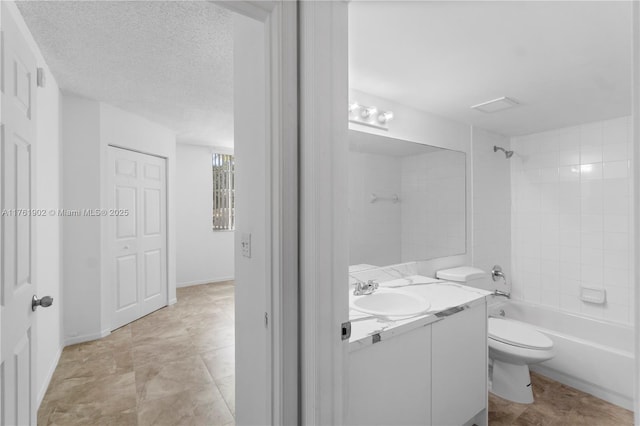 full bathroom with visible vents, toilet, shower / bathtub combination, a textured ceiling, and vanity