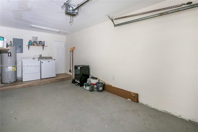 garage with electric panel, a garage door opener, water heater, and washing machine and clothes dryer