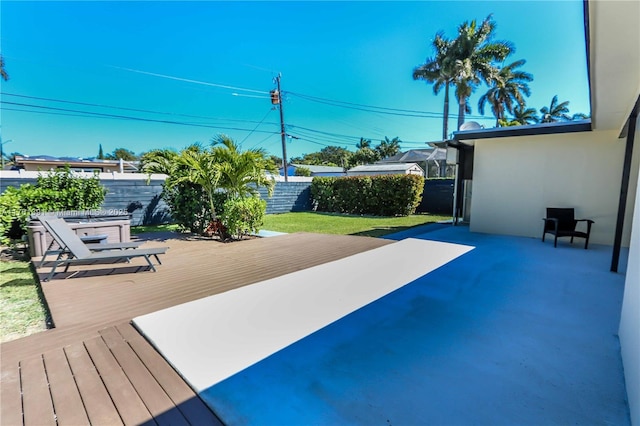 view of patio / terrace featuring a deck and a fenced backyard