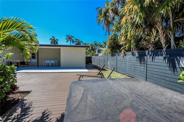 deck featuring fence