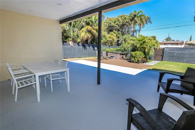 view of patio / terrace with outdoor dining area and fence