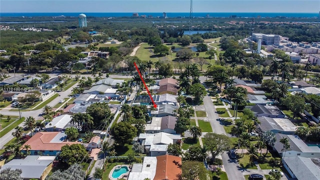 aerial view with a residential view and a water view