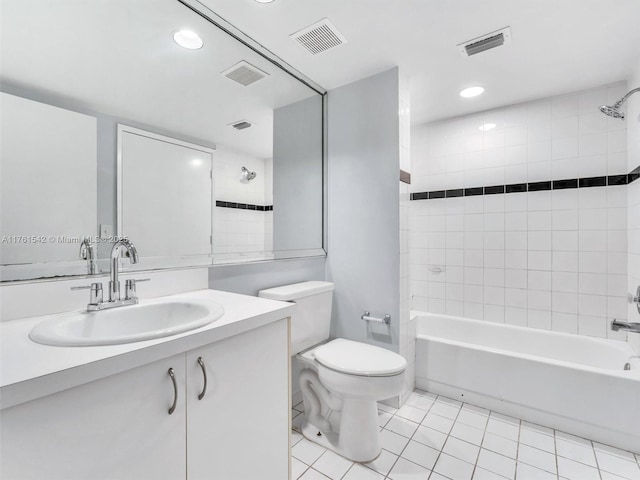 bathroom featuring tile patterned floors, toilet, visible vents, and shower / bathtub combination