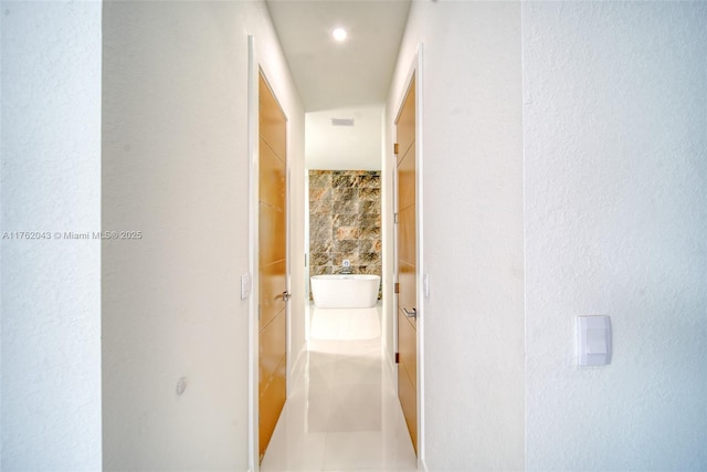 601SW 13th St, Cape Coral, FL 33991 - hallway featuring tile patterned floors
