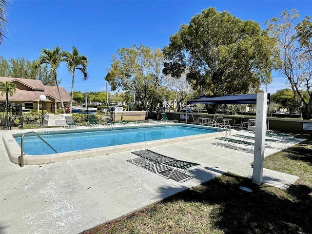 pool featuring a patio area